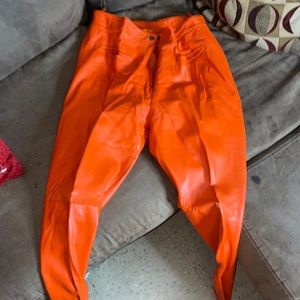 Orange leather pants